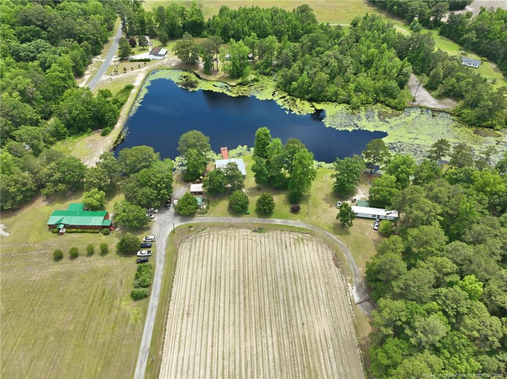 10400 Ruth Vinson Road Autryville, NC 28318 - Photo 7 of 49 an aerial view of a house with yard