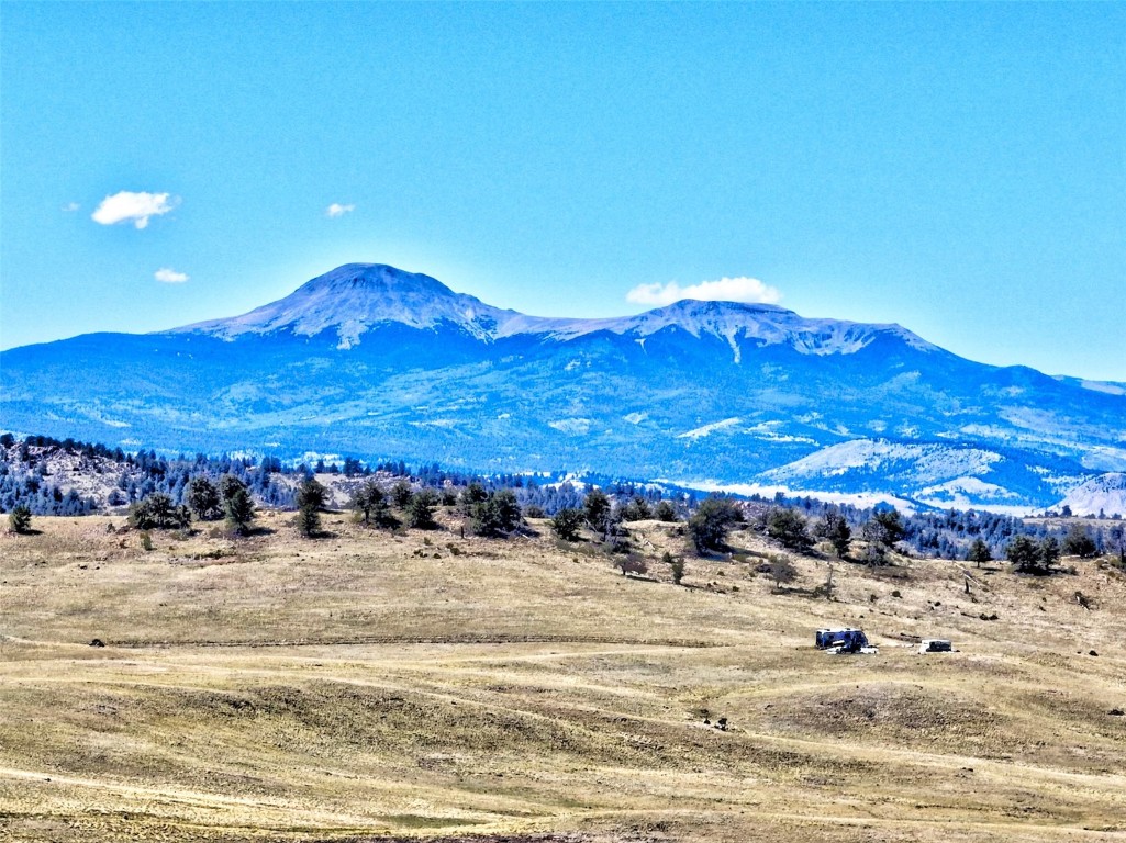 3972 Seneca Road Hartsel, CO 80449 - Photo 3 of 12 a view of a lake with a mountain