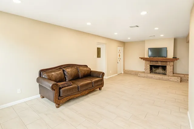a living room with furniture and a couch