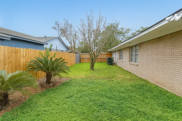 a house view with a garden space
