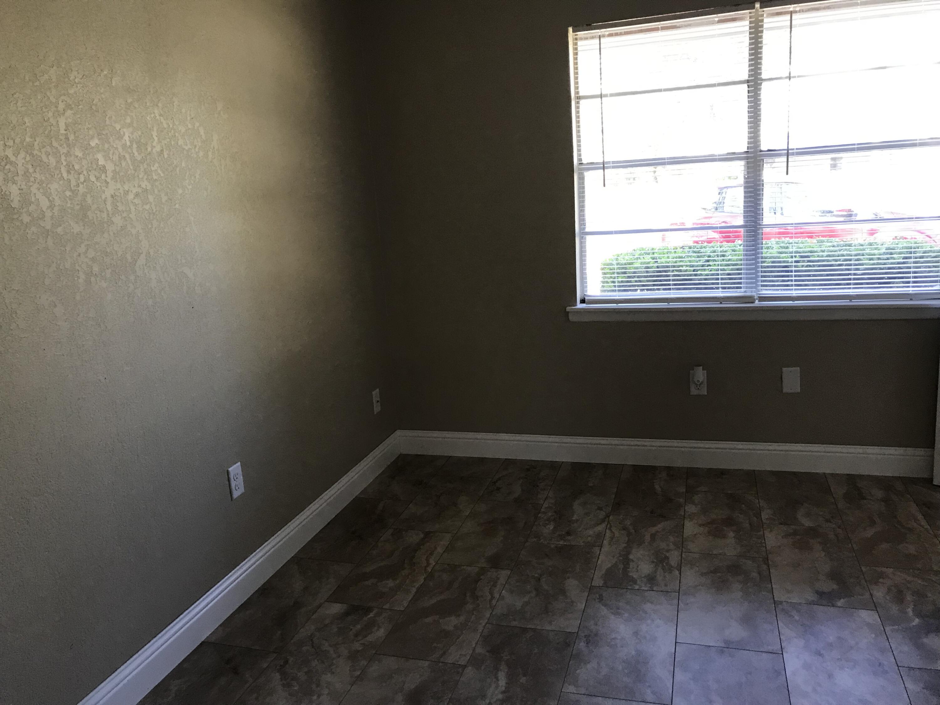 5438 Highway 4 Baker, FL 32531 - Photo 6 of 11 a view of an empty room with a window