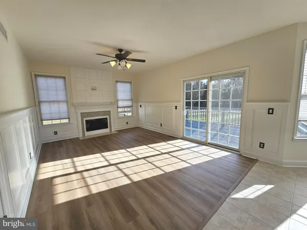 a living room with a fireplace