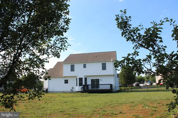 a view of balcony with wooden floor