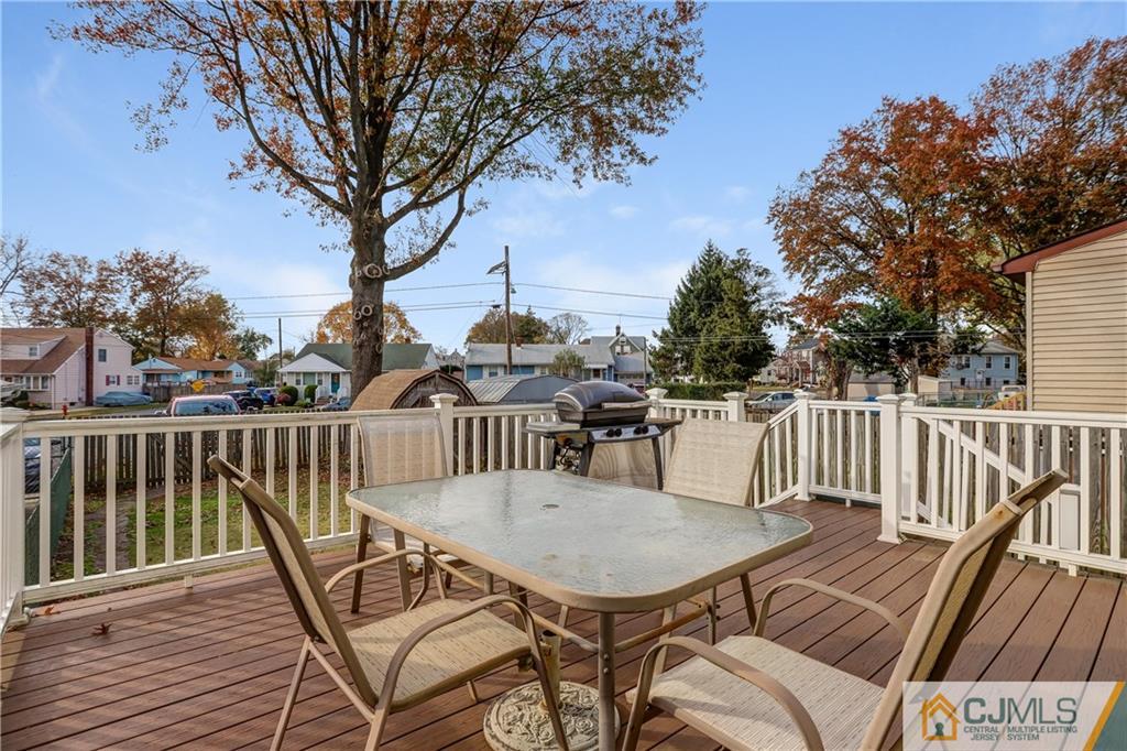 419 Crows Mill Road Fords, NJ 08863 - Photo 10 of 10 a view of a balcony with a table and chairs