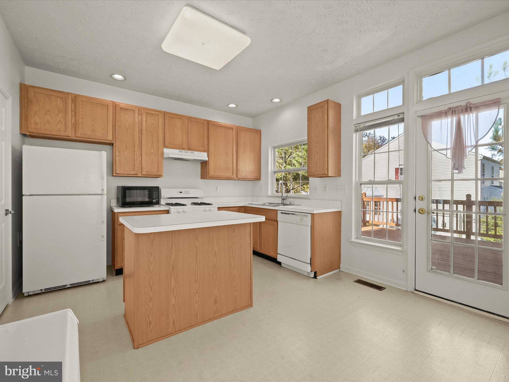 8238 Lyndhurst Street Laurel, MD 20724 - Photo 2 of 50 Spacious kitchen with deck access