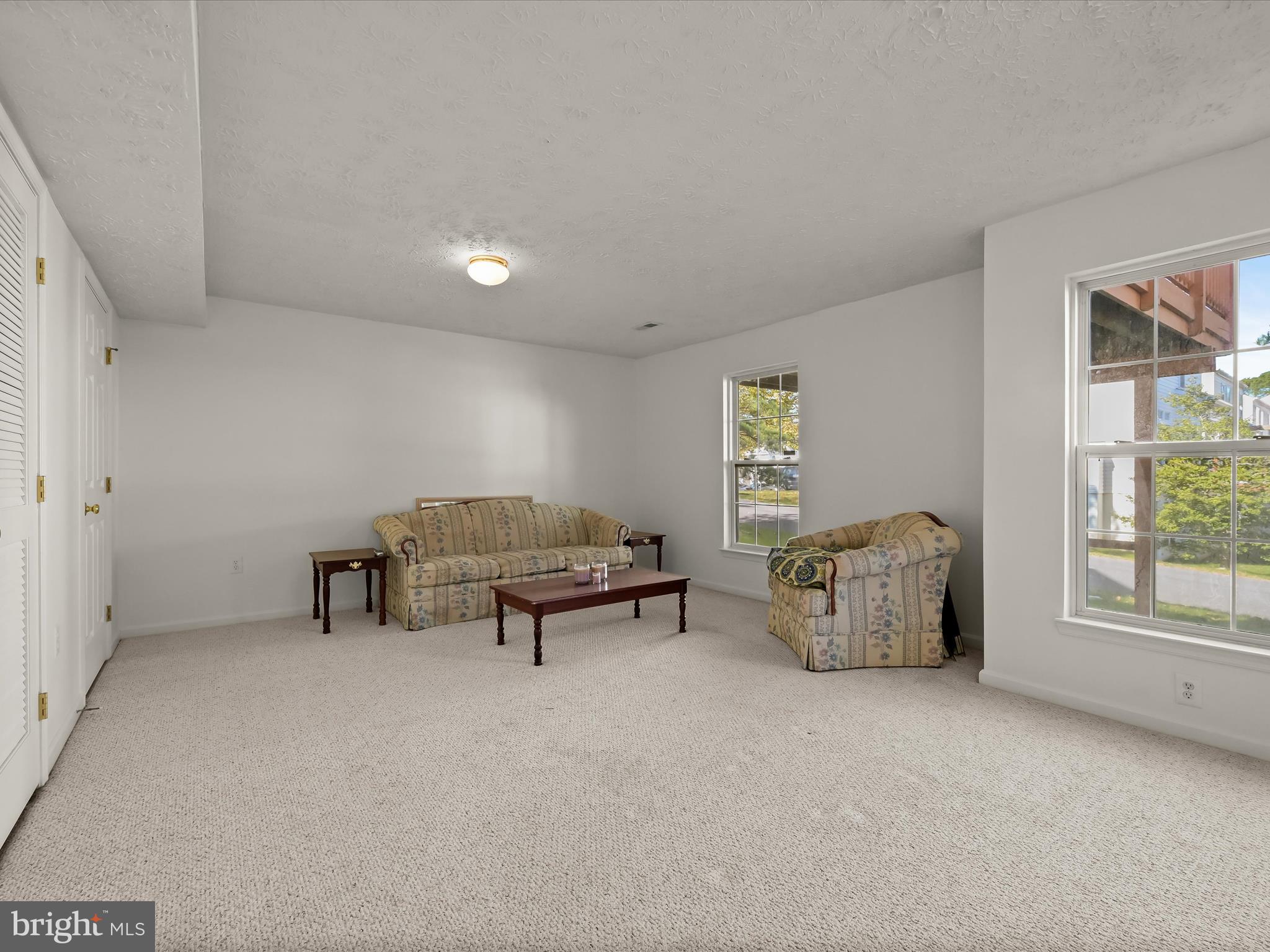 8238 Lyndhurst Street Laurel, MD 20724 - Photo 30 of 50 Family room with new carpet