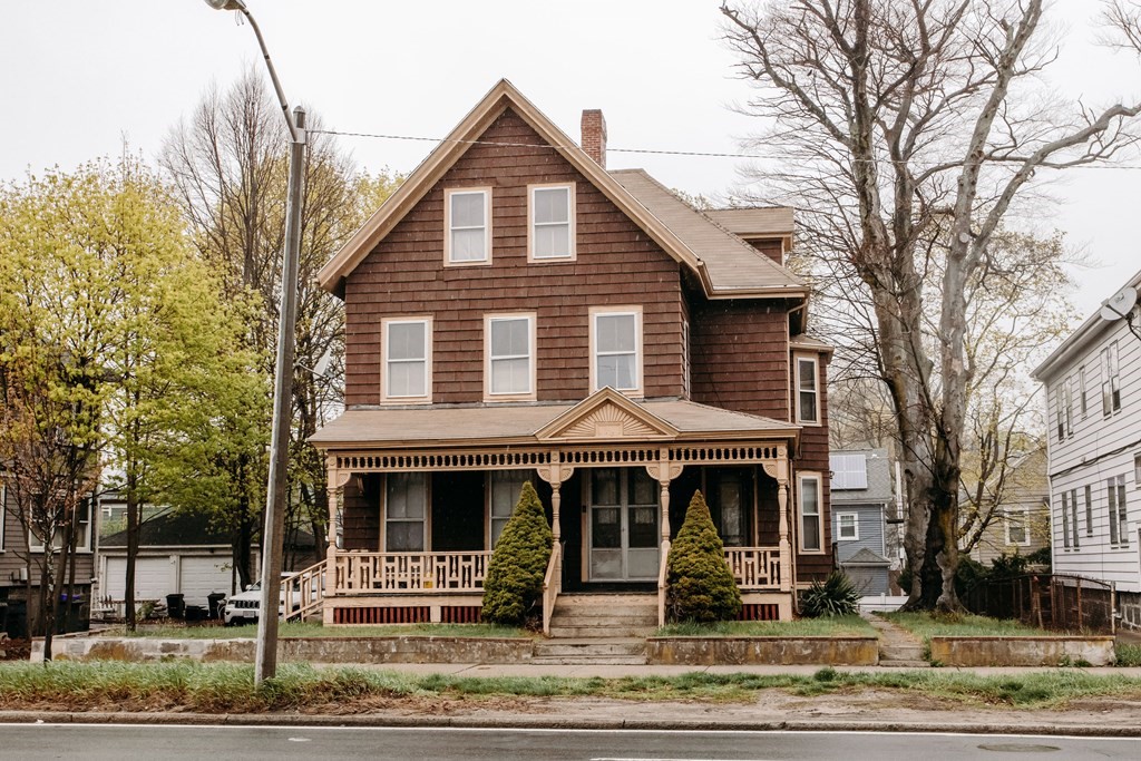 452 Gallivan Boulevard Boston, MA 02124 - Photo 1 of 24 a front view of a house with garden