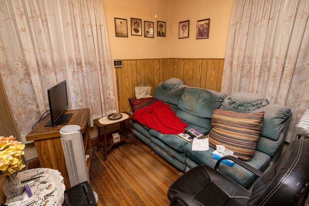 452 Gallivan Boulevard Boston, MA 02124 - Photo 11 of 24 a view of a room with furniture and a window