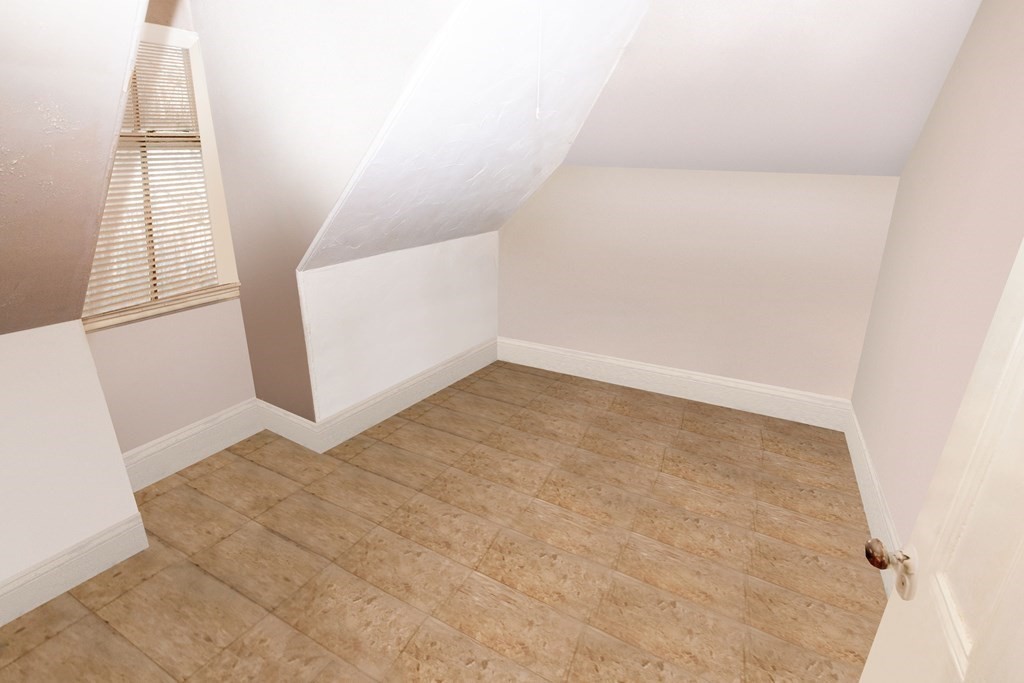452 Gallivan Boulevard Boston, MA 02124 - Photo 16 of 24 an empty room with windows