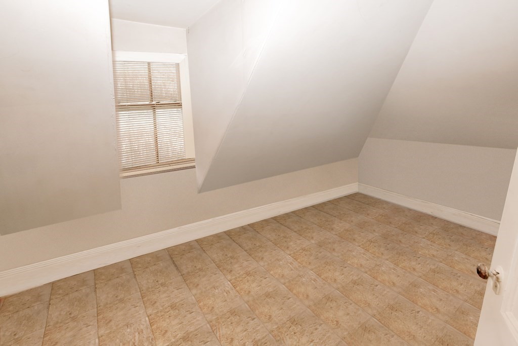452 Gallivan Boulevard Boston, MA 02124 - Photo 17 of 24 an empty room with a window