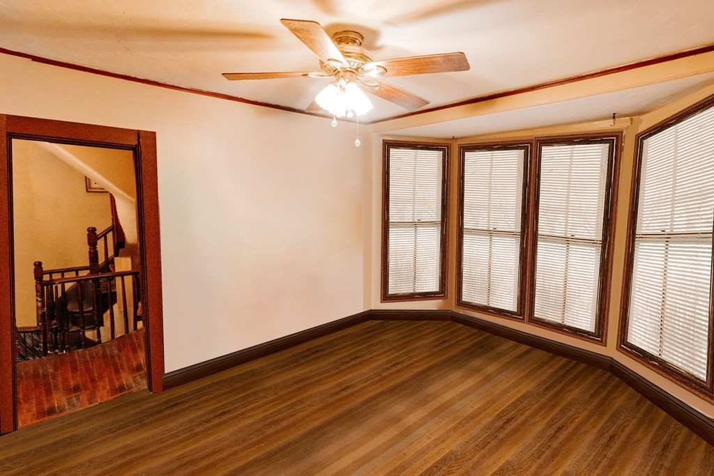 452 Gallivan Boulevard Boston, MA 02124 - Photo 23 of 24 wooden floor in an empty room with a window