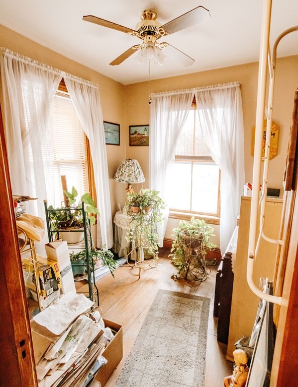452 Gallivan Boulevard Boston, MA 02124 - Photo 4 of 24 a view of a living room with furniture and a window