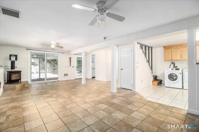 a view of a livingroom with furniture