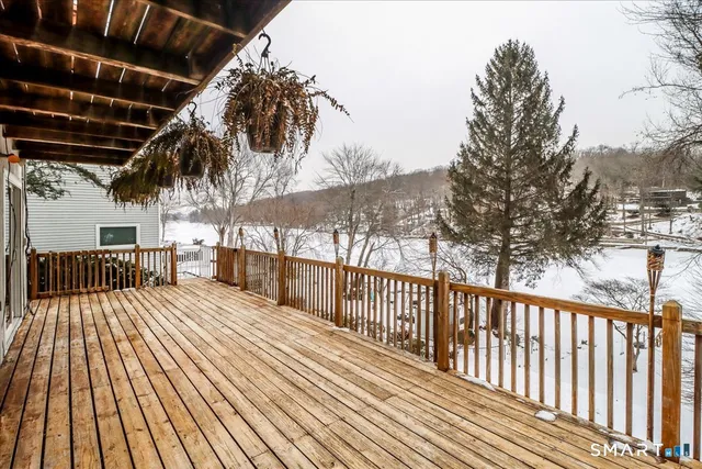 a view of a backyard with wooden floor