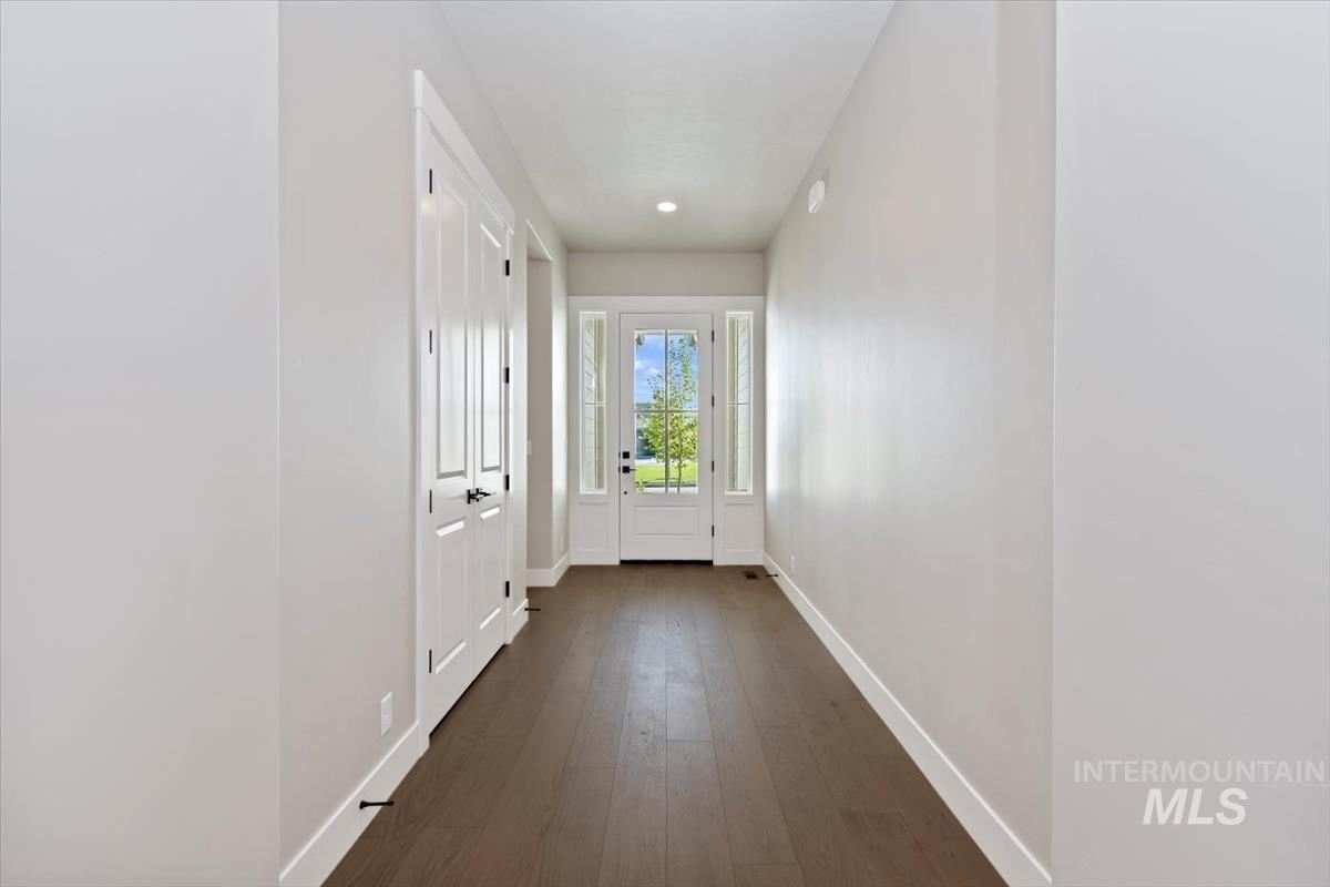 7353 Powell Place Eagle, ID 83714 - Photo 5 of 45 Doorway featuring hardwood / wood-style flooring and recessed lighting