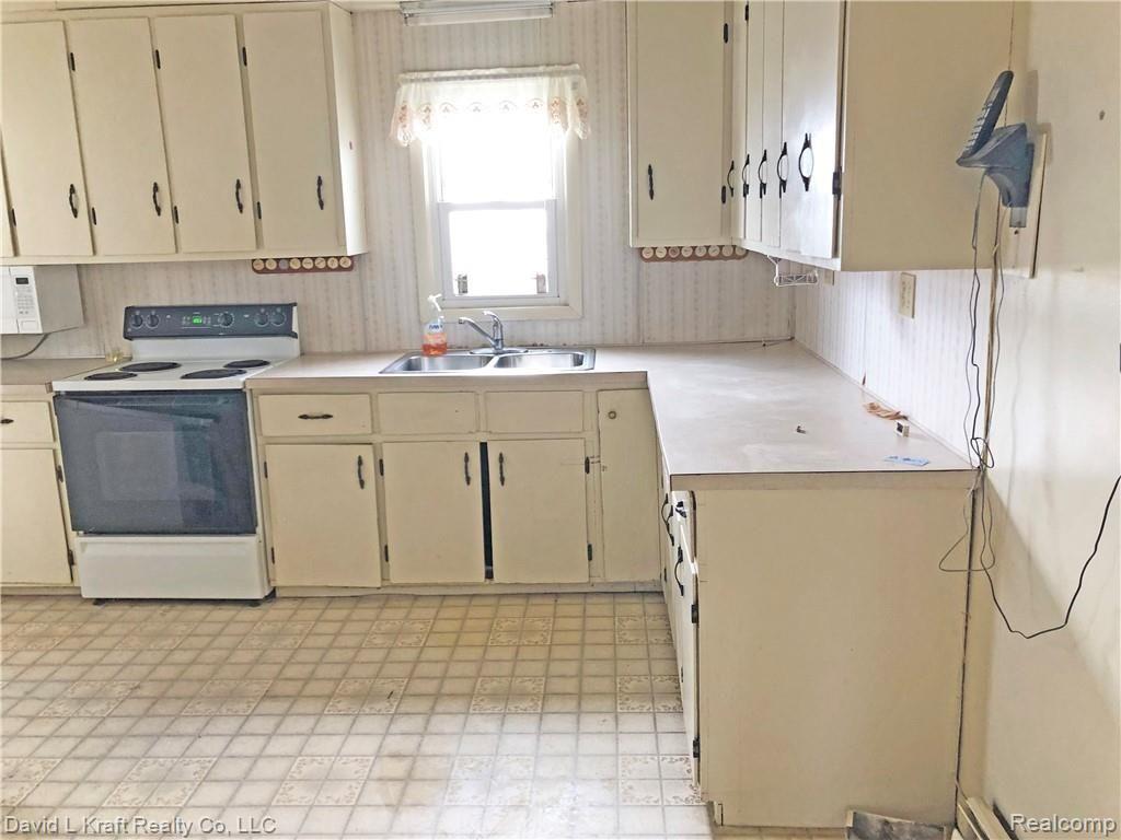 7679 Sebewaing Road Owendale, MI 48754 - Photo 2 of 10 7679SebewaingKitchen.jpg