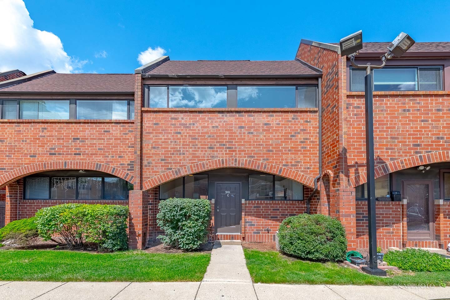 901 South Racine Avenue, Unit C Chicago, IL 60607 - Photo 1 of 39 a front view of a house with garden