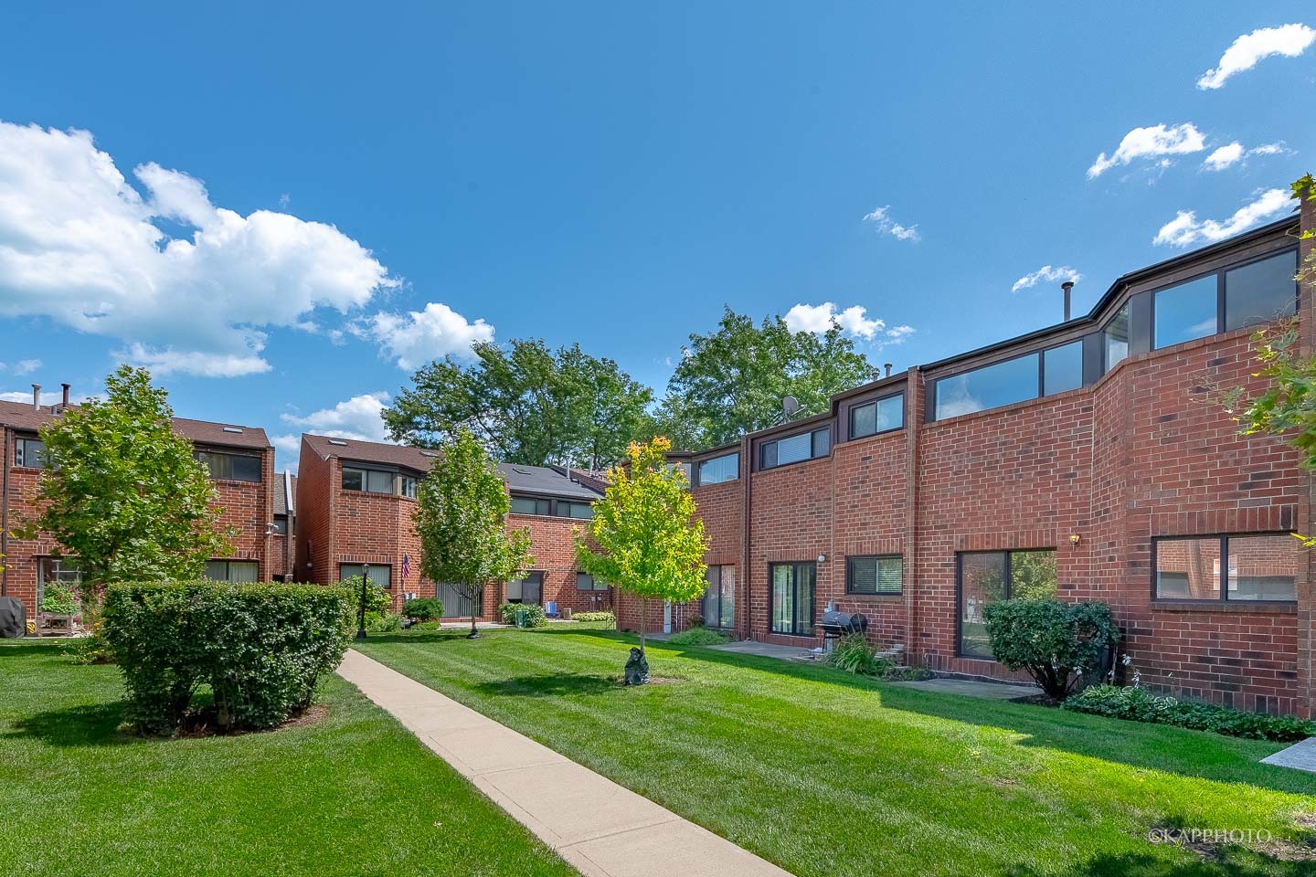 901 South Racine Avenue, Unit C Chicago, IL 60607 - Photo 16 of 39 front view of a house with a yard