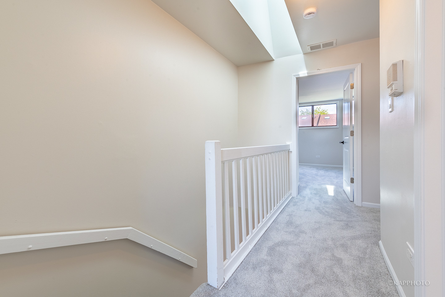 901 South Racine Avenue, Unit C Chicago, IL 60607 - Photo 20 of 39 a view of a hallway with wooden floor