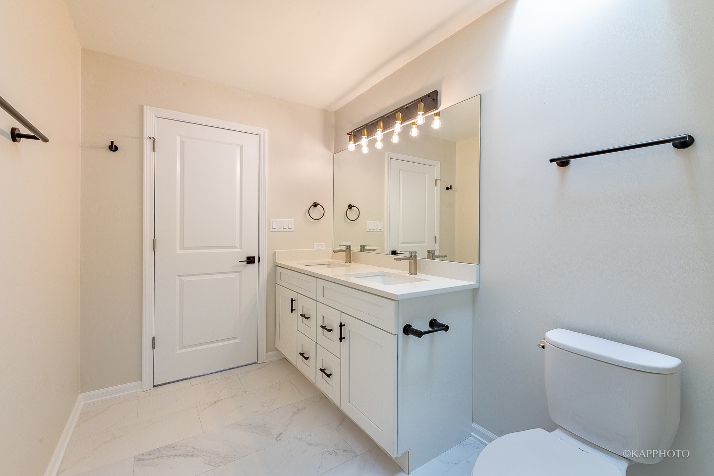 901 South Racine Avenue, Unit C Chicago, IL 60607 - Photo 23 of 39 a bathroom with a sink mirror and toilet