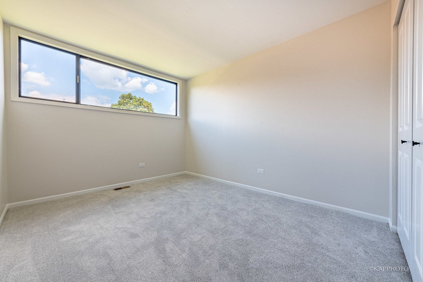901 South Racine Avenue, Unit C Chicago, IL 60607 - Photo 26 of 39 a view of an empty room with painting on the wall