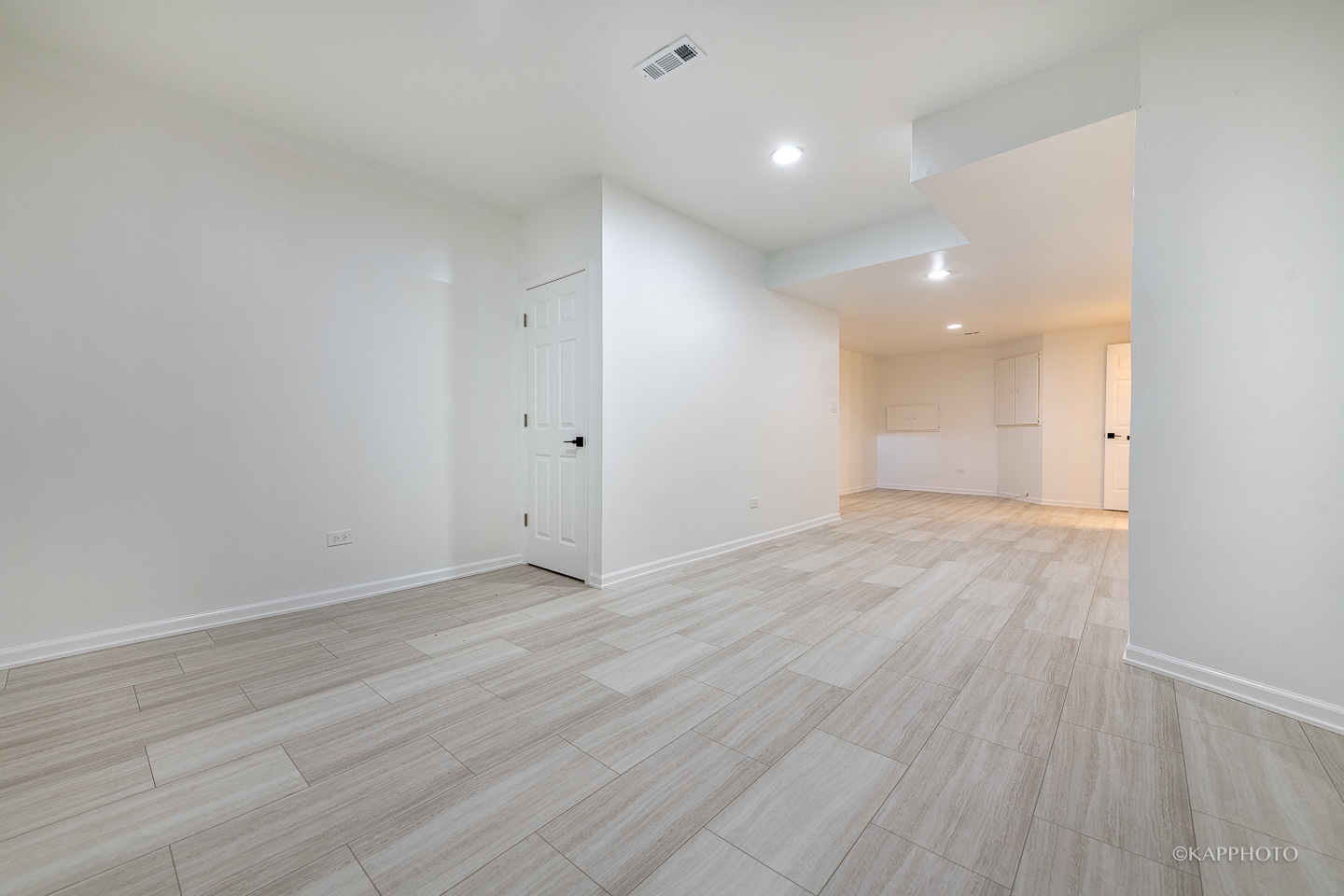 901 South Racine Avenue, Unit C Chicago, IL 60607 - Photo 30 of 39 a view of an empty room with wooden floor