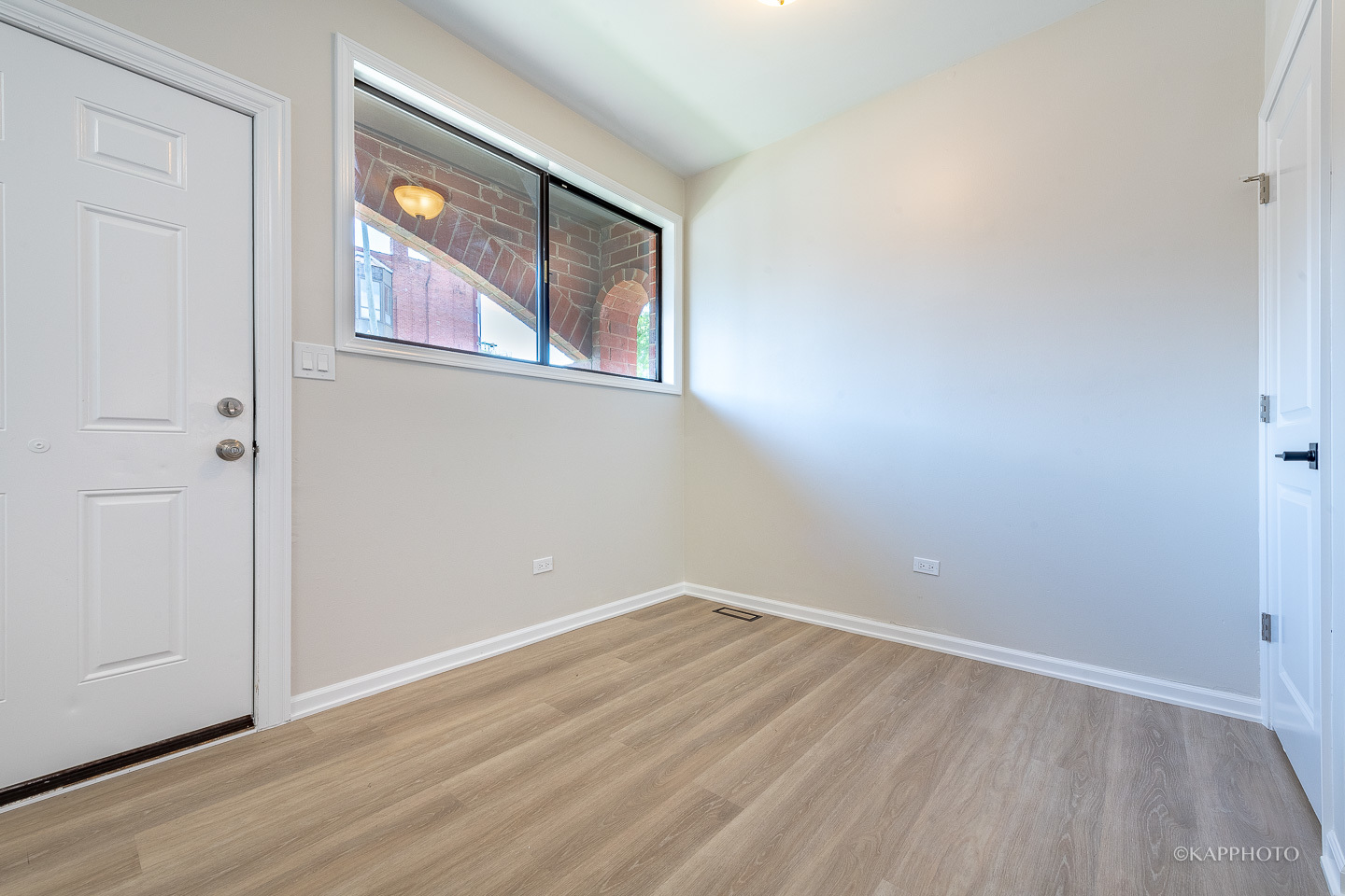 901 South Racine Avenue, Unit C Chicago, IL 60607 - Photo 4 of 39 wooden floor in an empty room