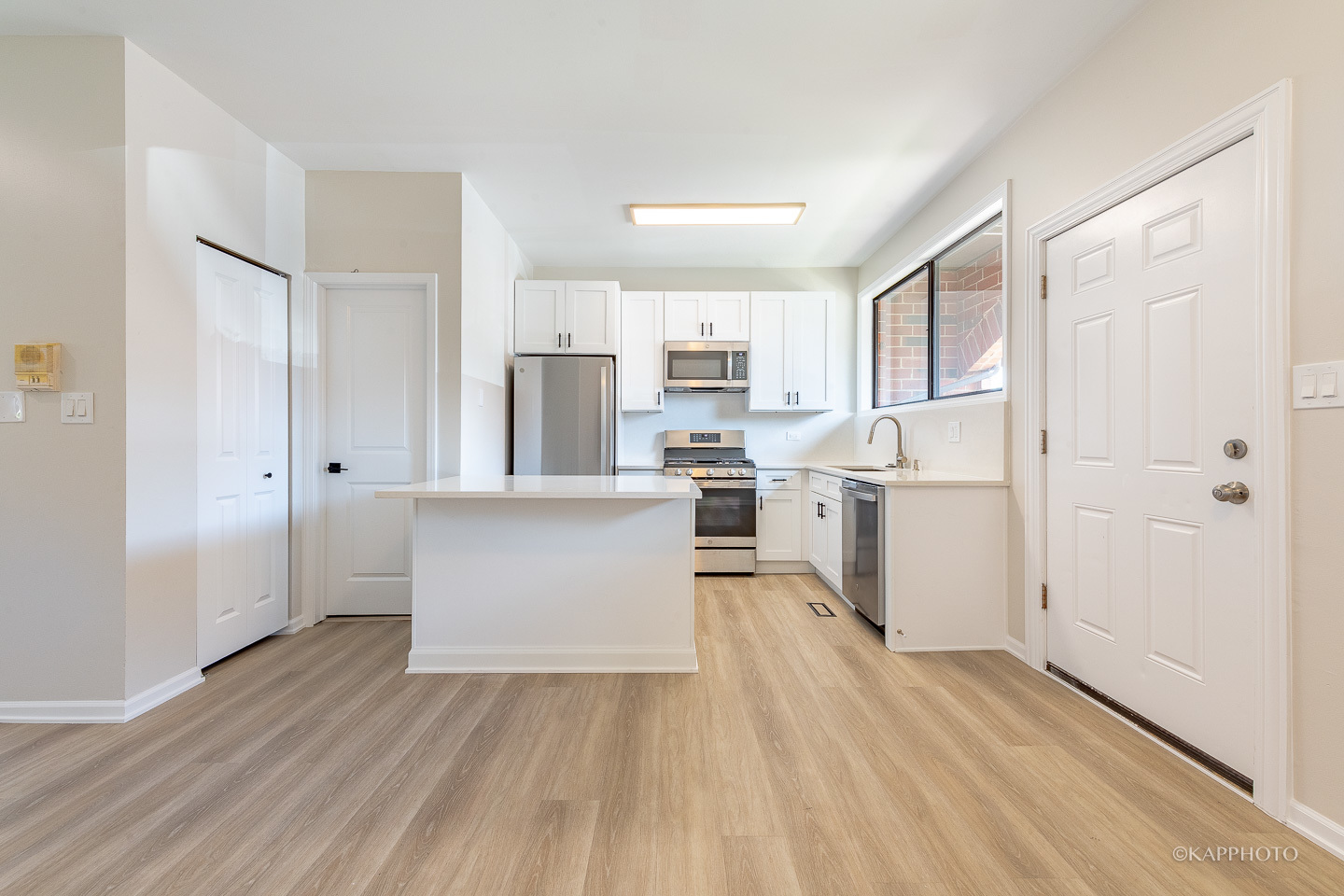 901 South Racine Avenue, Unit C Chicago, IL 60607 - Photo 5 of 39 a view of kitchen with wooden floor