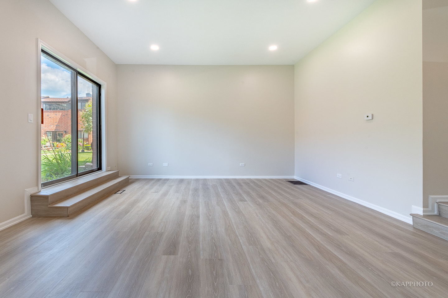 901 South Racine Avenue, Unit C Chicago, IL 60607 - Photo 9 of 39 wooden floor in an empty room with a window