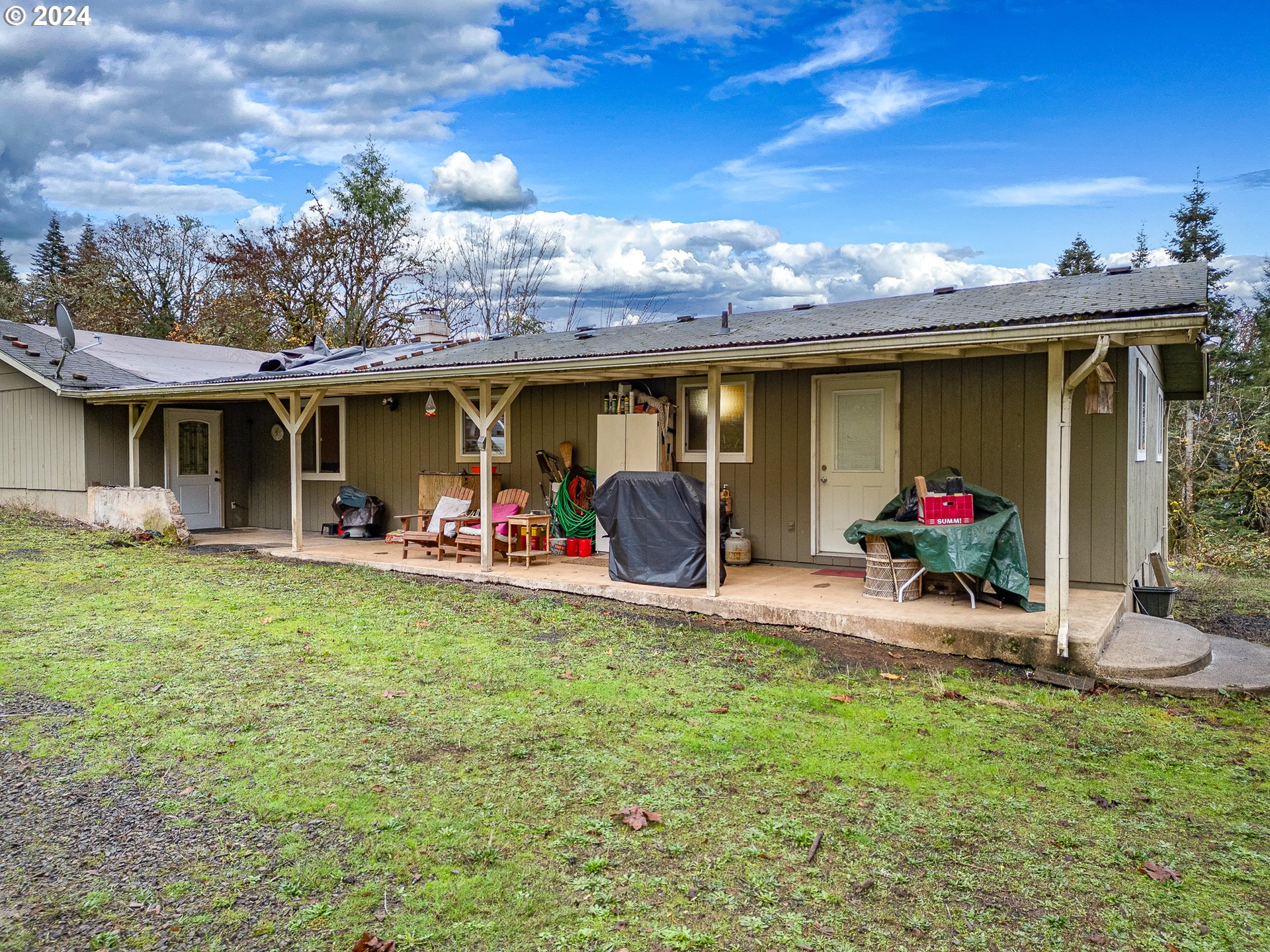 28383 Pleasant Valley Road Sweet Home, OR 97386 - Photo 6 of 34 a view of a house with backyard