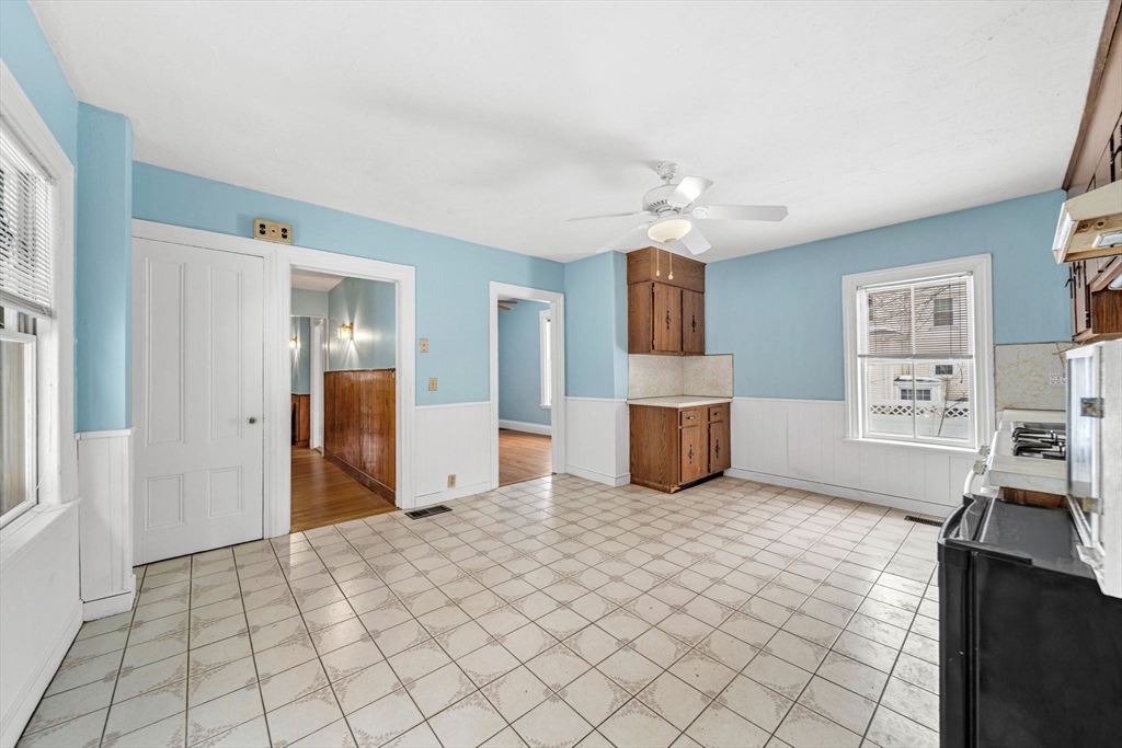 28 Linden Place Dedham, MA 02026 - Photo 17 of 42 a view of a kitchen with furniture and wooden floor