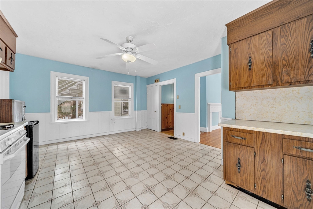 28 Linden Place Dedham, MA 02026 - Photo 19 of 42 a spacious bedroom with a bed and a window