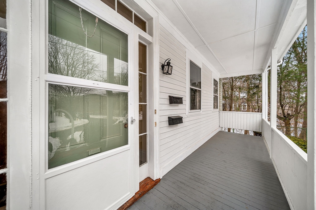 28 Linden Place Dedham, MA 02026 - Photo 2 of 42 a view of an entryway with wooden floor and windows