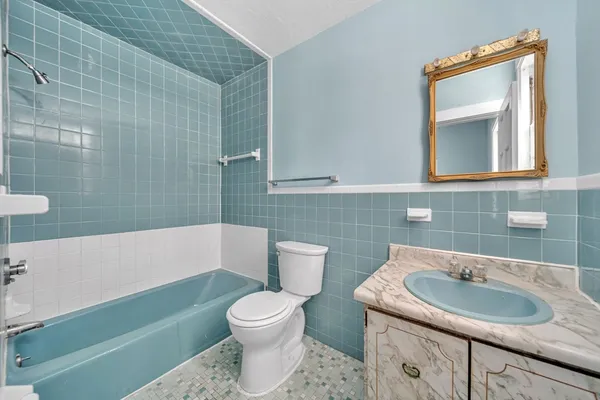 a bathroom with a sink and a toilet