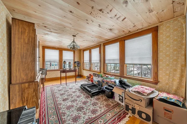 a living room with hard wood floor