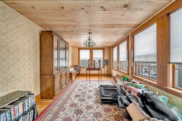 a living room with furniture and a table