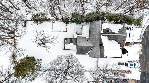 a view of a back yard of the house