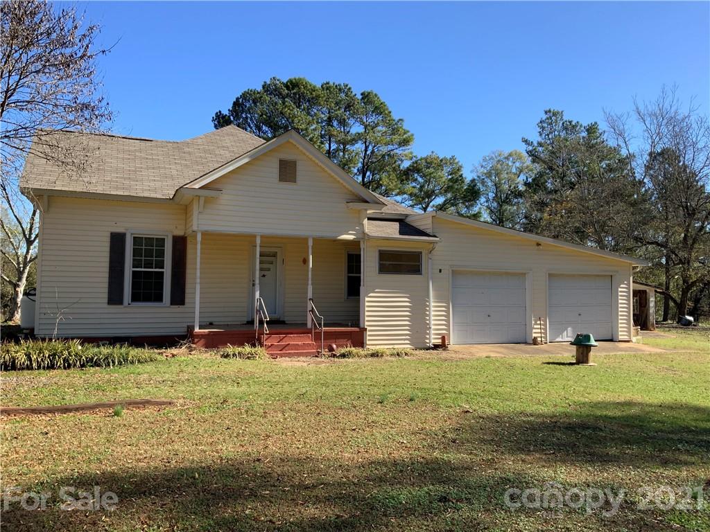 2149 Smithford Road Hickory Grove, SC 29717 - Photo 1 of 16 a front view of a house with a yard