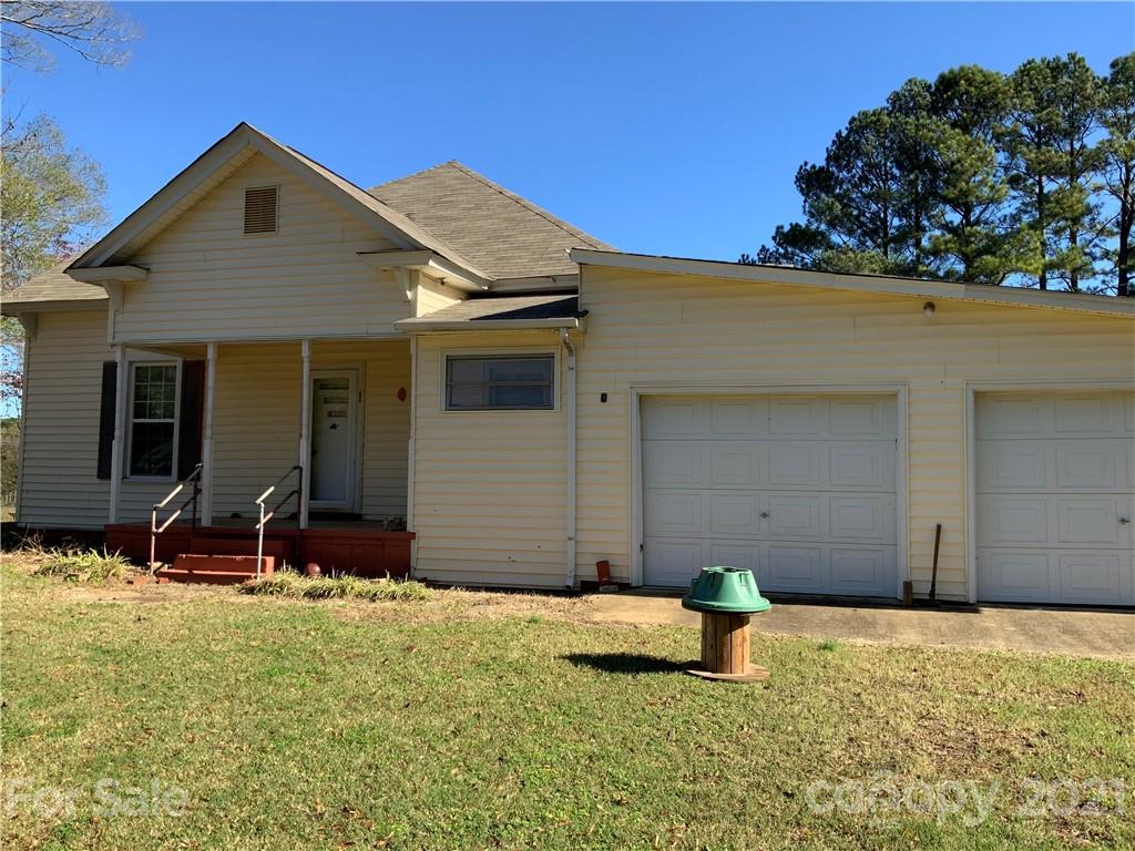 2149 Smithford Road Hickory Grove, SC 29717 - Photo 2 of 16 a front view of a house with a yard