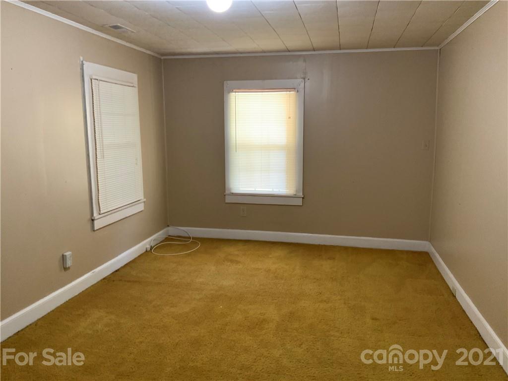 2149 Smithford Road Hickory Grove, SC 29717 - Photo 13 of 16 a view of an empty room with a window