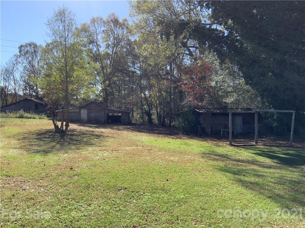 2149 Smithford Road Hickory Grove, SC 29717 - Photo 5 of 16 a view of a swimming pool with a yard