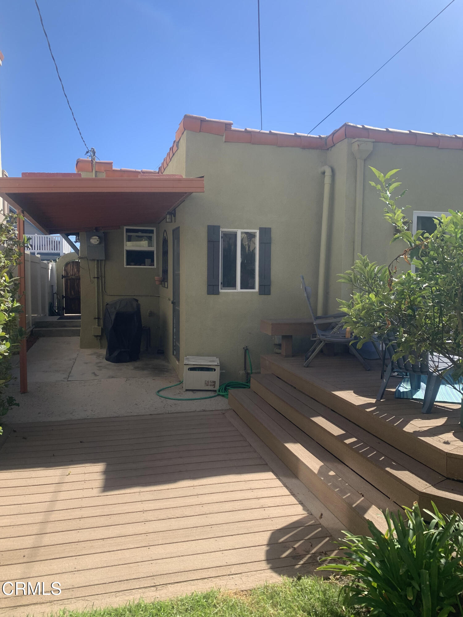 141 Burbank Avenue Oxnard, CA 93035 - Photo 2 of 8 a front view of a house with a yard