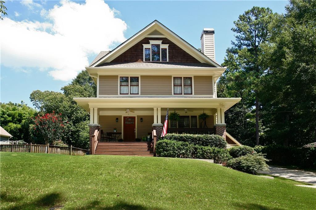 1348 Thomas Road Decatur, GA 30030 - Photo 1 of 1 a front view of a house with a yard