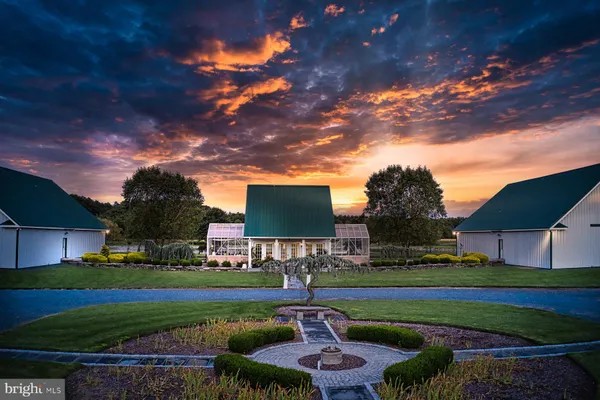 a dining room with a table and chairs