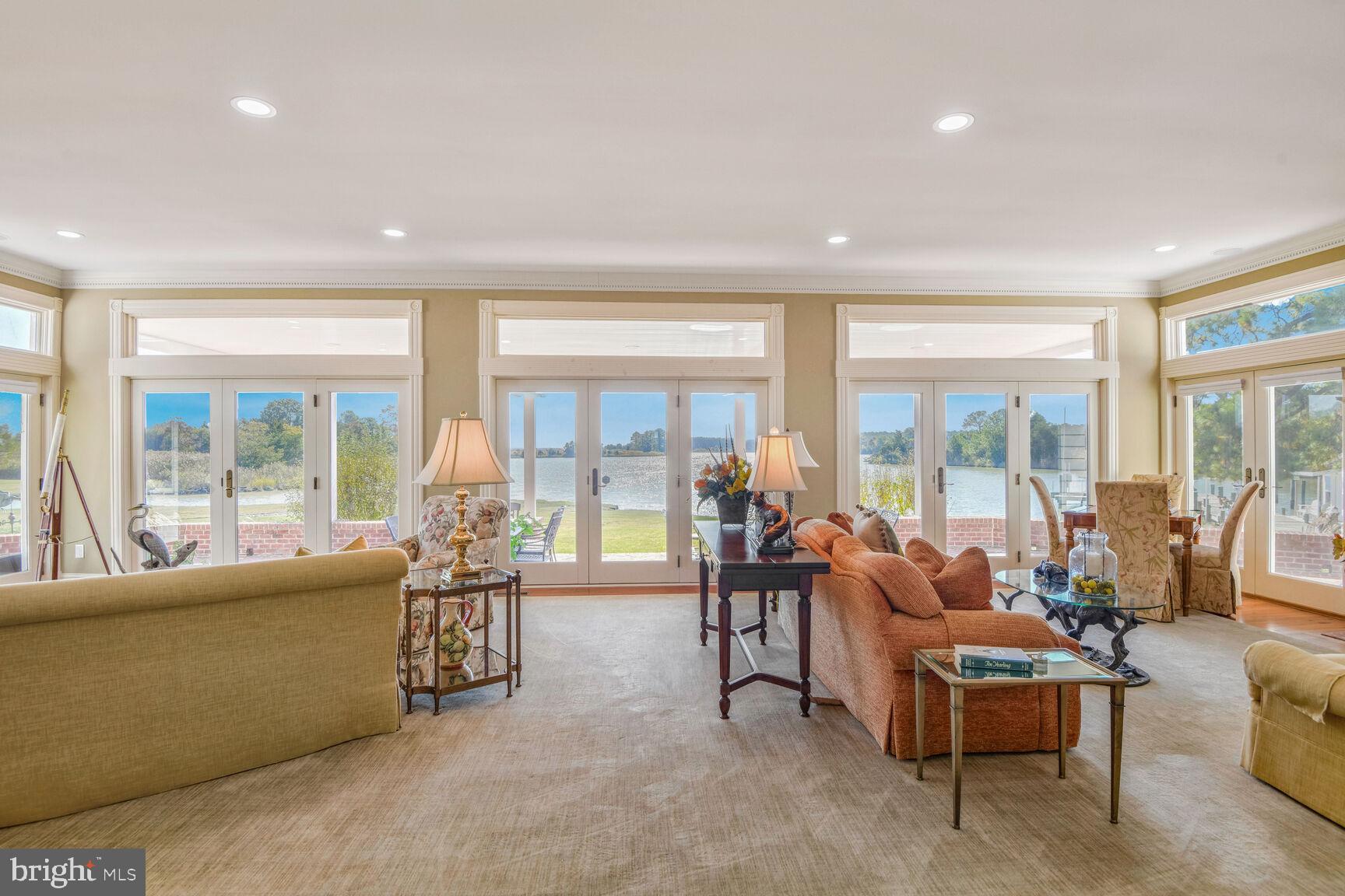 5289 Ferry Neck Road Royal Oak, MD 21662 - Photo 20 of 80 a living room with furniture and a large window