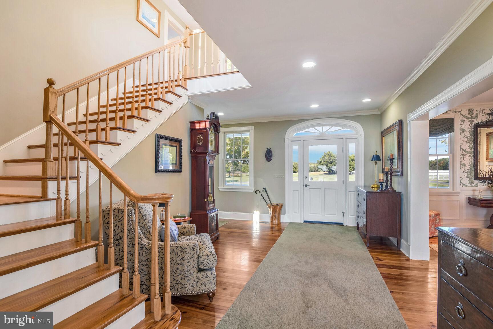 5289 Ferry Neck Road Royal Oak, MD 21662 - Photo 23 of 80 a view of entryway and hall with wooden floor