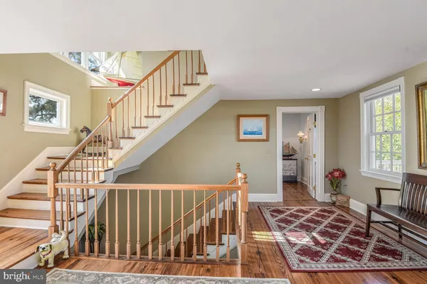 a view of backyard with swimming pool and outdoor seating