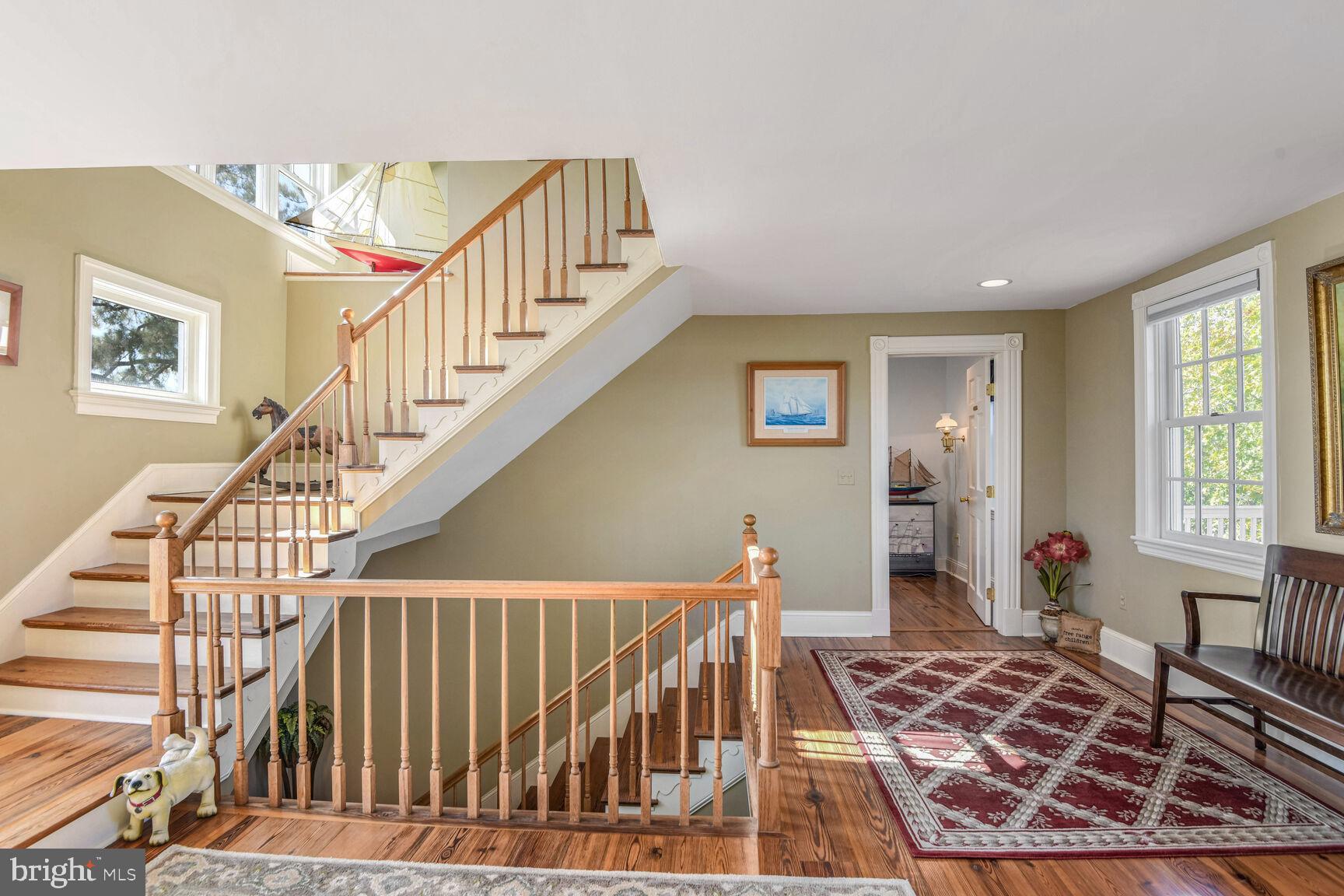 5289 Ferry Neck Road Royal Oak, MD 21662 - Photo 33 of 80 a view of entryway and hall with wooden floor
