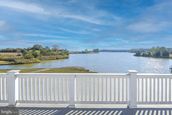 a view of swimming pool with an outdoor space and seating area
