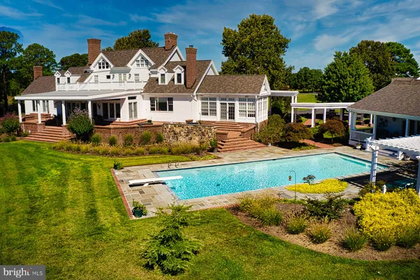 a city view with a table under an umbrella